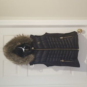 Michael Kors hooded down winter vest size M, black with faux fur hood.